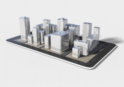 des immeubles en 3D qui se sortent d'une tablette numérique 